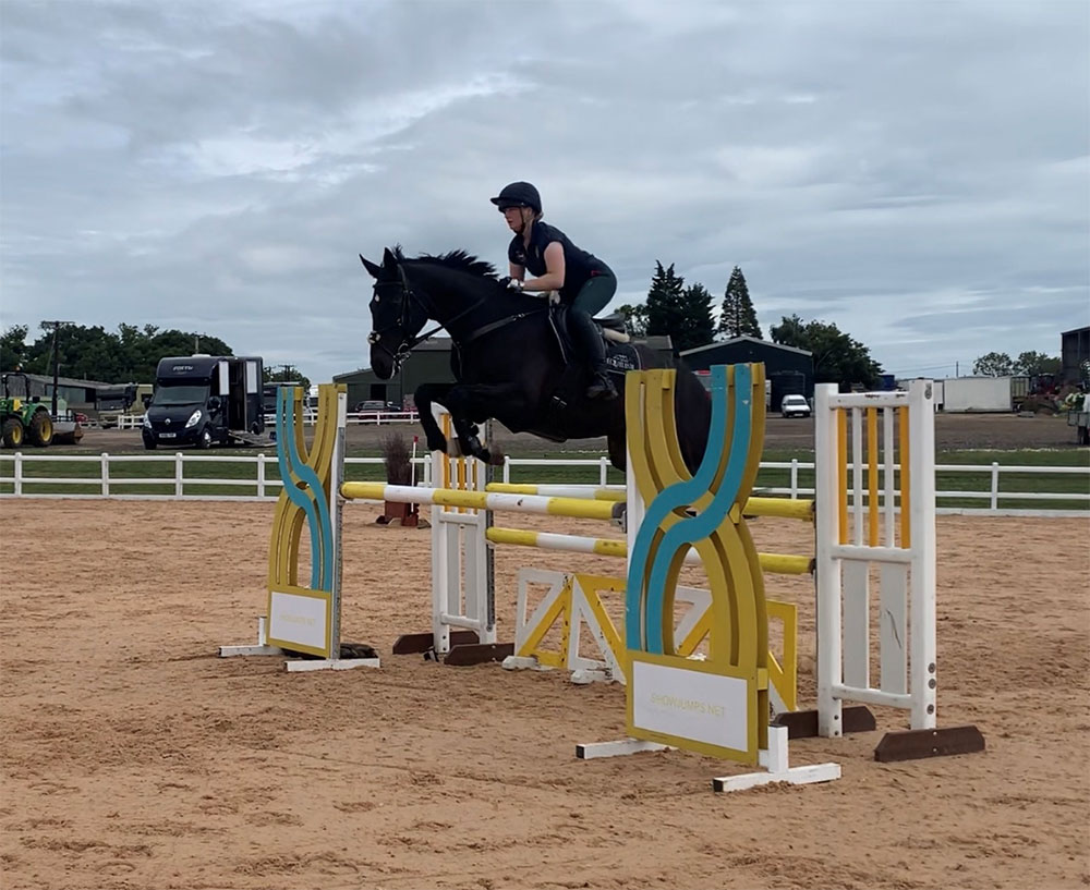 Horse and Rider show jumping training