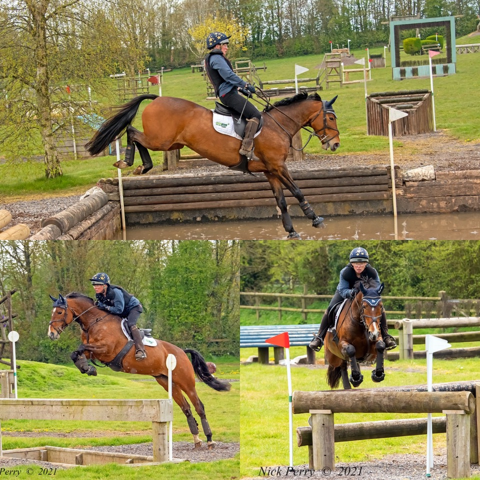 Horse and rider jumping cross country